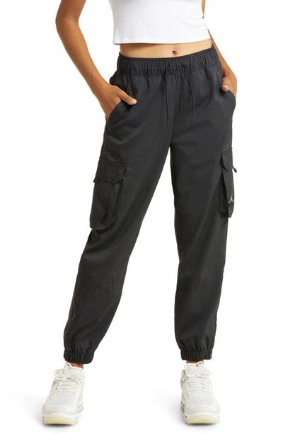 Shop Jordan Sport Tunnel Pants In Black/ Black/ Stealth