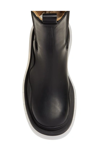 Shop Bottega Veneta Bv Tire Clear Sole Chelsea Boot In Black-black-transparent