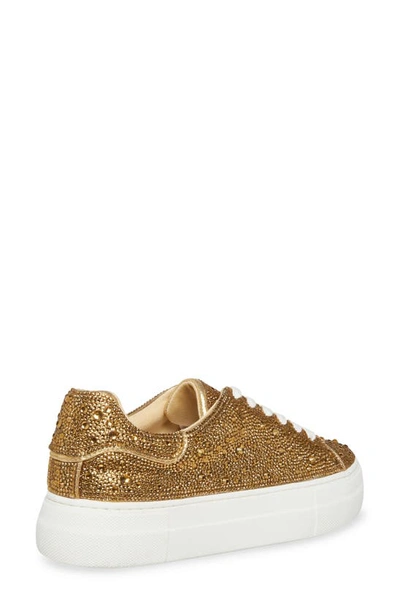 Shop Betsey Johnson Sidny Crystal Pavé Platform Sneaker In Gold