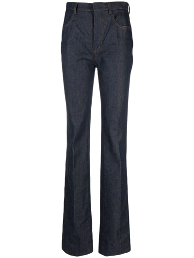 Shop Saint Laurent Dark Blue High-waisted Bootcut Jeans