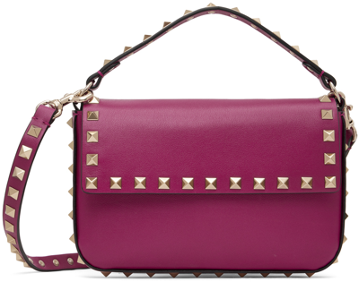 Shop Valentino Pink Rockstud Crossbody Pouch In M24 Rose Violet