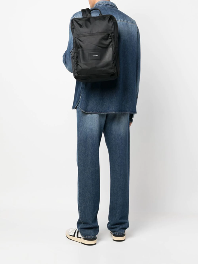 Shop Calvin Klein Logo Zipped Backpack In Schwarz