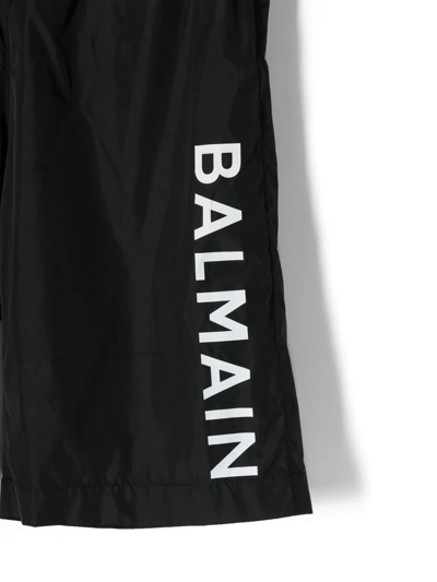 Shop Balmain Teen Logo-print Swim Shorts In Black