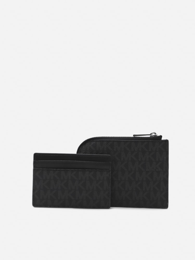 Shop Michael Kors Hudson 2 In 1 Canvas Wallet In Black