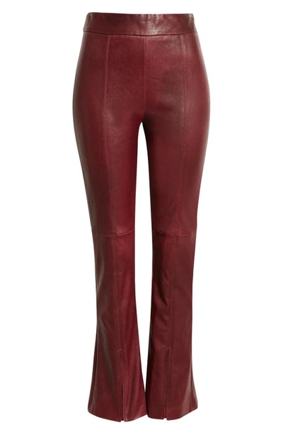 Shop Twp Slit Cuff Leather Flare Pants In Burgundy