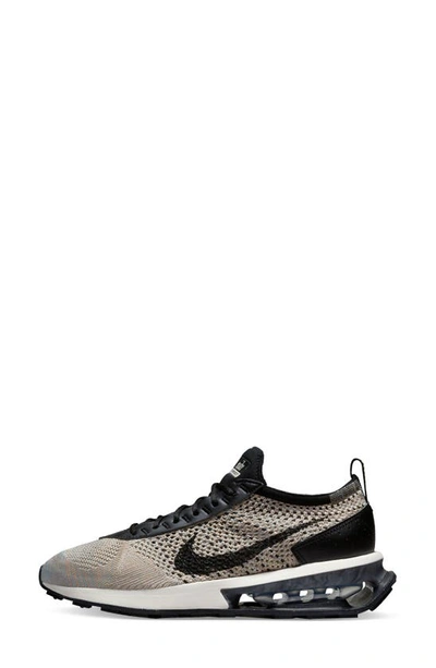 Shop Nike Air Max Flyknit Racer Sneaker In Sesame/ Black