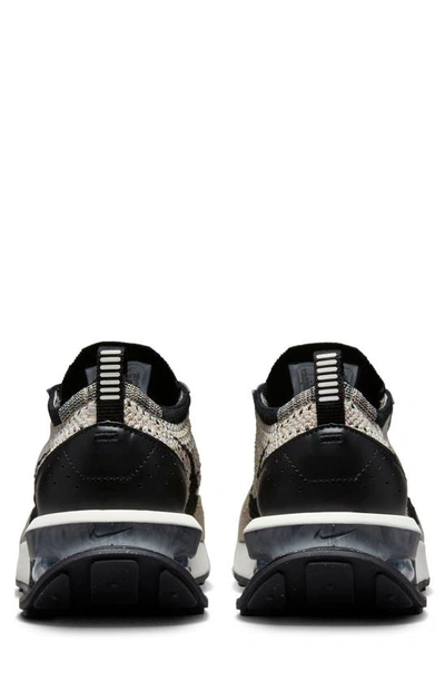 Shop Nike Air Max Flyknit Racer Sneaker In Sesame/ Black