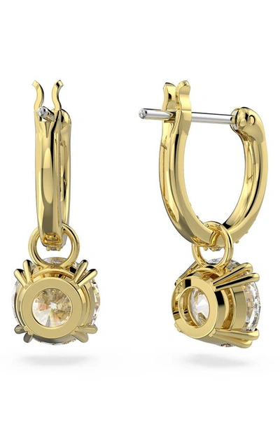 Shop Swarovski Constella Huggie Hoop Earrings In Yellow Gold