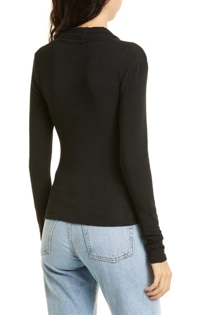 Shop Vince Wrap Front Long Sleeve Knit Top In Black
