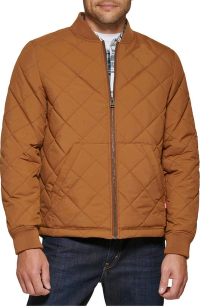 Shop Levi's Diamond Quilted Bomber Jacket In Brown