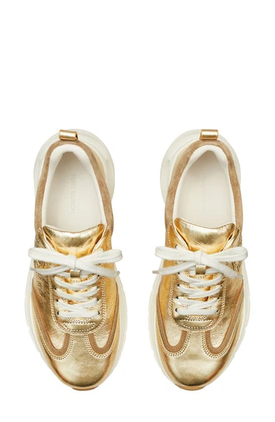 Shop Tory Burch Good Luck Sneaker In Gold / Alce