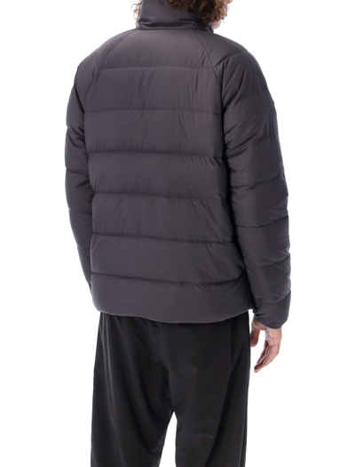 Shop Patagonia Reversible Silent Down Fleece Jacket In Black