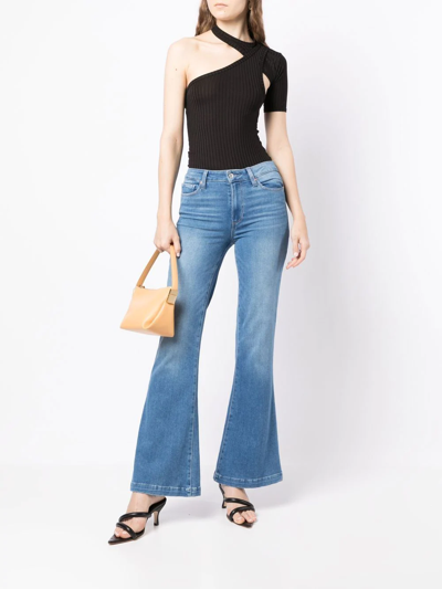 Shop Paige Genevieve 32" Flared Jeans In Blue