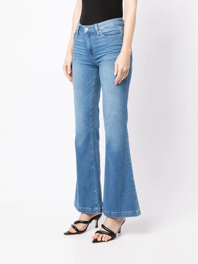 Shop Paige Genevieve 32" Flared Jeans In Blue