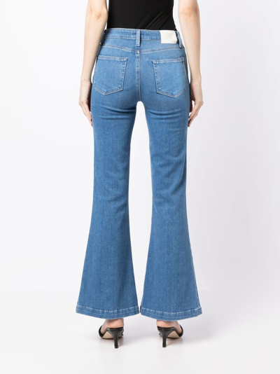 Shop Paige Genevieve 32" Flared Jeans In Blue