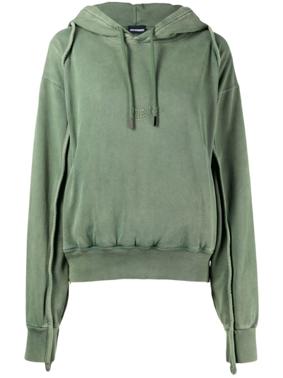 Shop Jacquemus Faded-effect Logo-embroidered Hoodie In Grün
