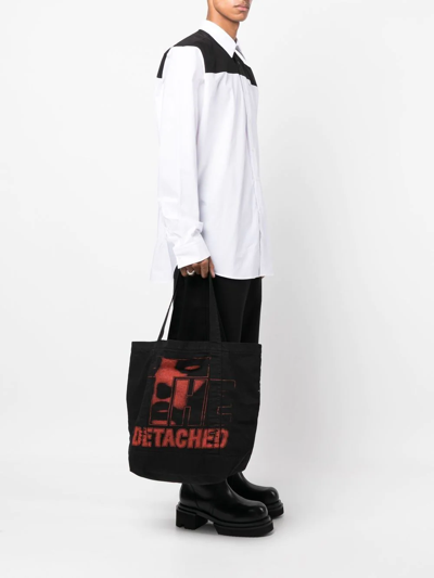 Shop Raf Simons Graphic-print Shoulder Bag In Schwarz