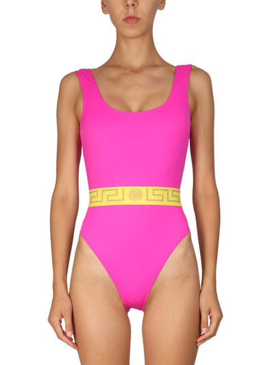 Shop Versace Greca Border Low Back Swimsuit In Pink