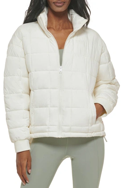Shop Levi's 733™ Box Quilted Puffer Jacket In Cream
