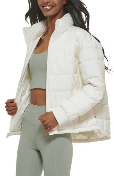 Shop Levi's 733™ Box Quilted Puffer Jacket In Cream