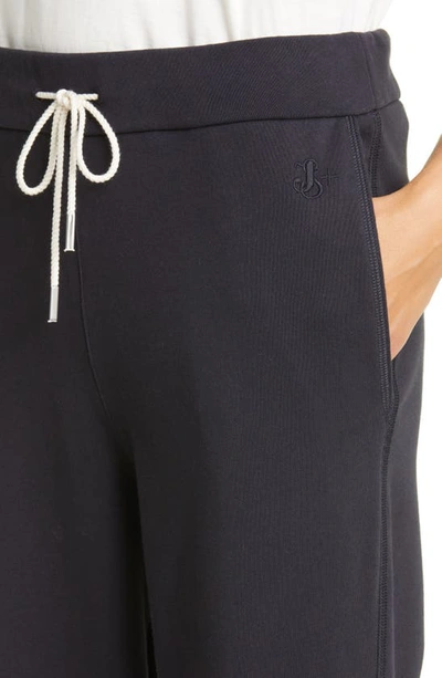 Shop Jil Sander Embroidered Cotton French Terry Joggers In Navy