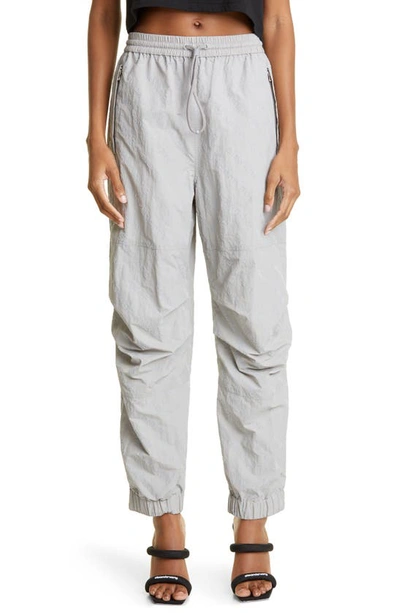 Shop Alexander Wang Flocked Logo Nylon Track Pants In Alloy