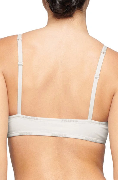 Skims Logo Trim Stretch Cotton Bralette In Marble