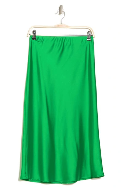 Shop Renee C Solid Satin Midi Skirt In Green