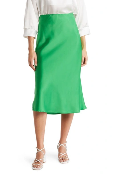 Shop Renee C Solid Satin Midi Skirt In Green