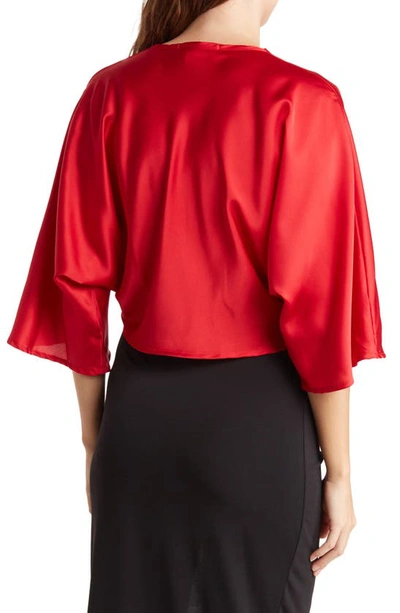 Shop Renee C Plunge Neck Long Sleeve Twisted Knot Satin Top In Red