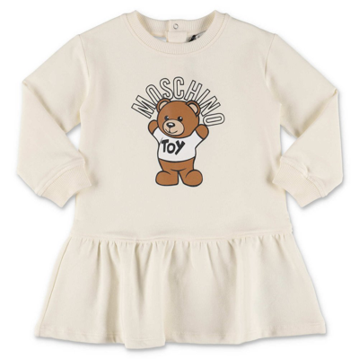 Shop Moschino Kids Teddy Bear Printed Long Sleeved Dress In White