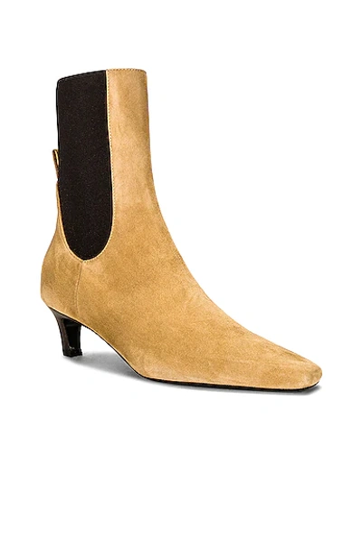 Shop Totême The Mid Heel Suede Boot In Beige