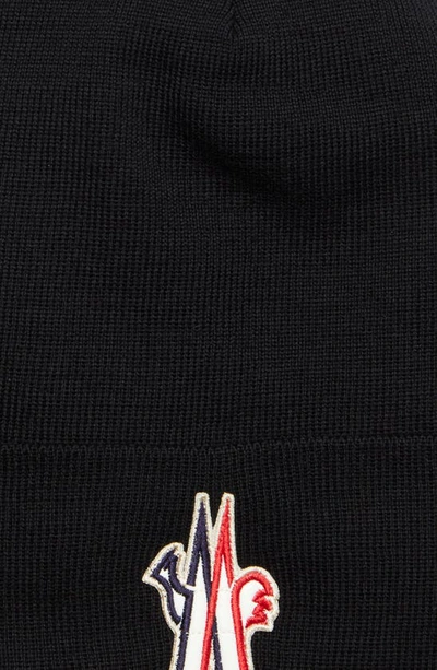 Shop Moncler Logo Patch Ribbed Virgin Wool Beanie In Black