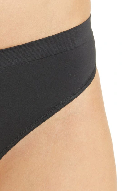 Shop Skims Soft Smoothing Seamless Thong In Eclipse