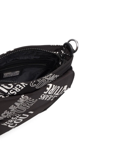 Shop Versace Jeans Couture All-over Logo-print Crossbody Bag In Black