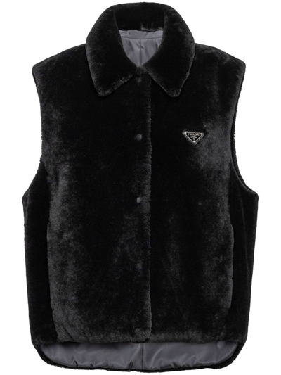 Shop Prada Reversible Shearling Vest In Schwarz