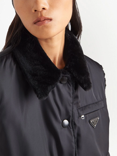 Shop Prada Reversible Shearling Vest In Schwarz