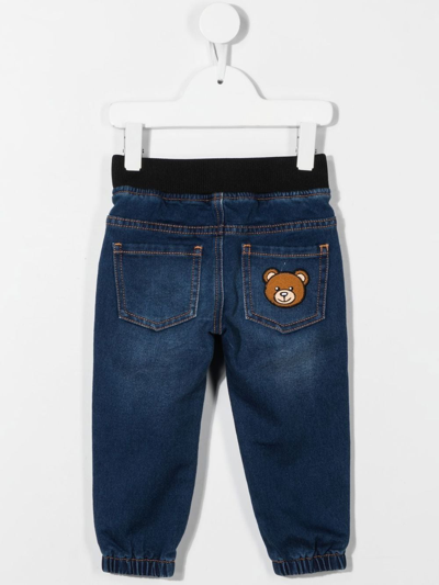 Moschino Logo-print Denim Pants In Blue