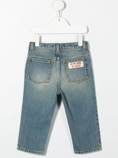 Shop Gucci Logo-print Slim-cut Jeans In Blue