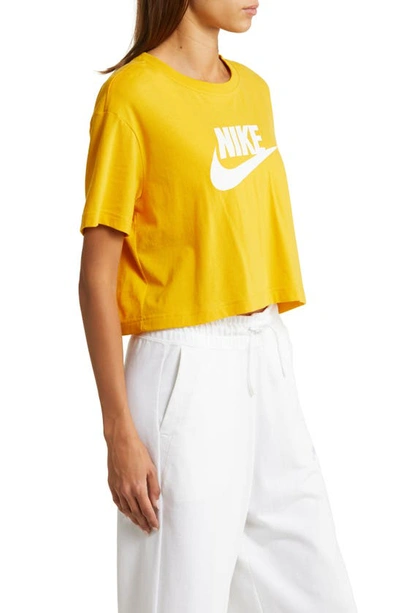 Shop Nike Sportswear Essential Crop Graphic Tee In Yellow Ochre
