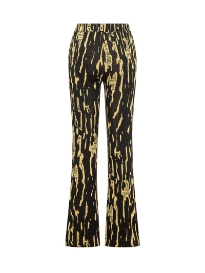 Shop Ambush Graphic Printed Slit Flared Pants In Giallo Fluo