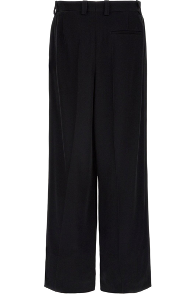Shop Balenciaga Straight Buttoned Trousers In Black