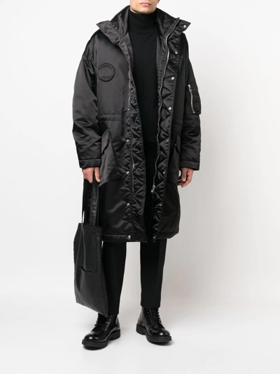 Shop Etudes Studio Concealed Hooded Coat In Black