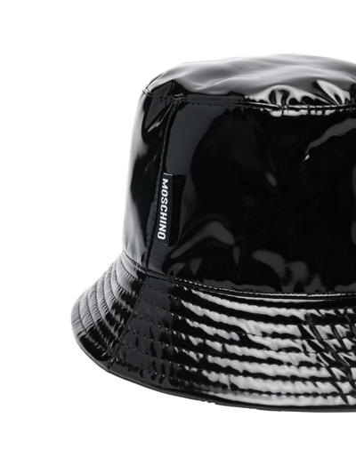 Shop Moschino Patent Bucket Hat In Black