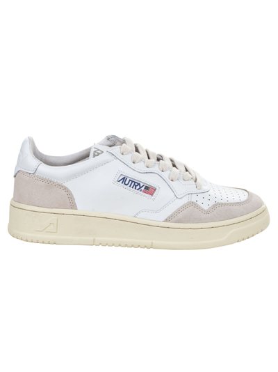Shop Autry Logo Patched Sneakers In Leather/suede White