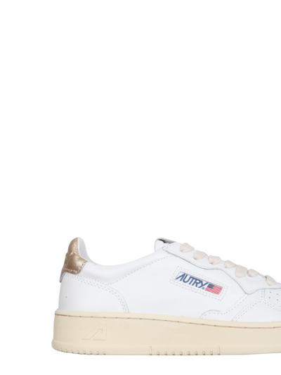 Shop Autry Leather Sneakers In Leat White Gold