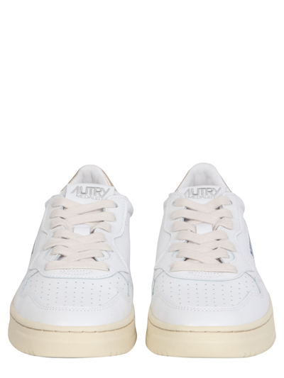 Shop Autry Leather Sneakers In Leat White Gold