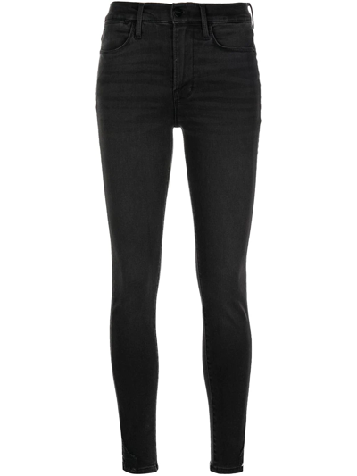 Shop Frame High-rise Skinny Jeans In Black