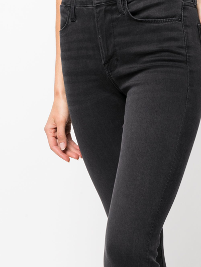 Shop Frame High-rise Skinny Jeans In Black