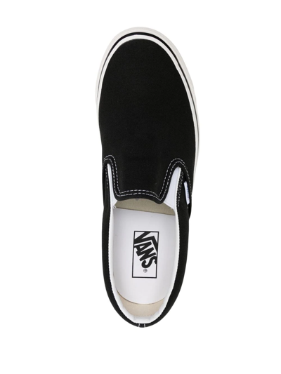 Shop Vans Ua Classic Slip-on 98 Dx Sneakers In Black